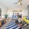 ceiling fan and light fixture in large, open living room